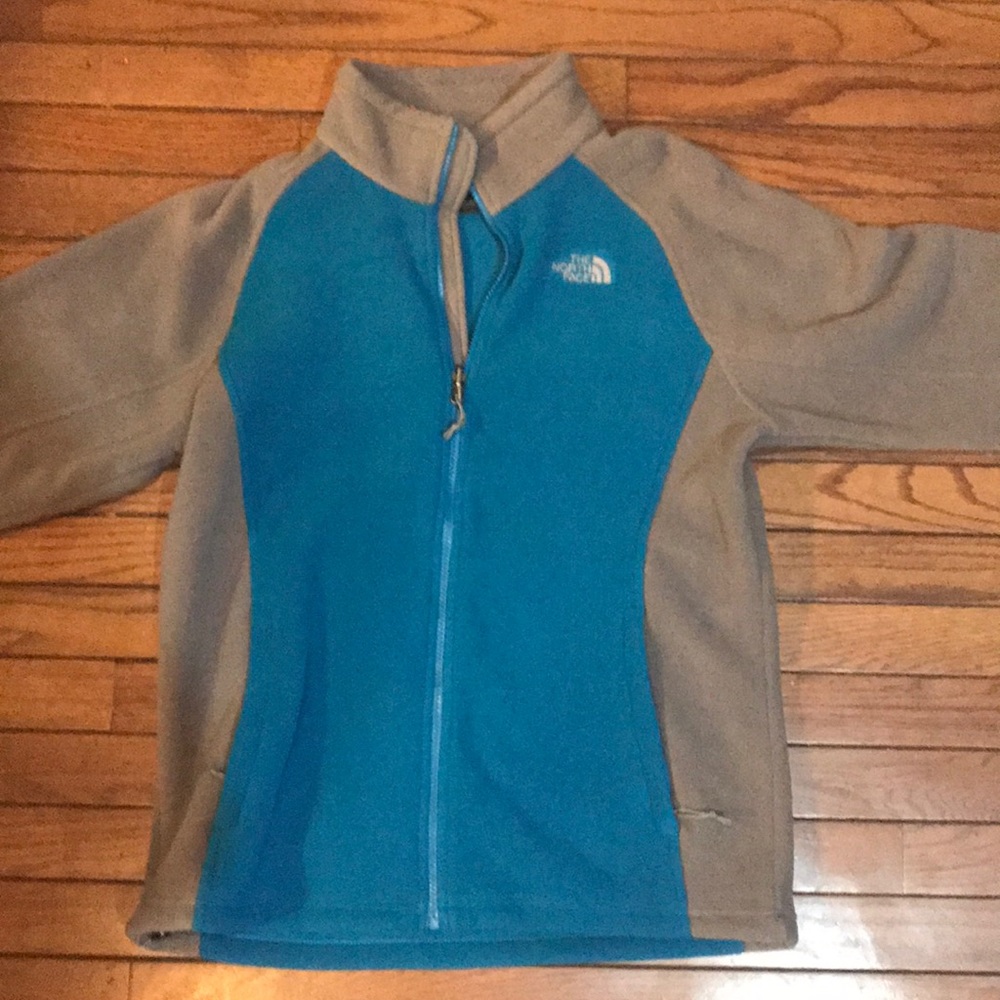 Grey and blue north face zip up